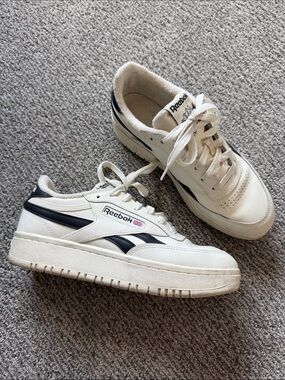Reebok White Leather Sneakers with Black Stripes